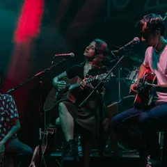 A trio setup at Fandom, Bangalore. The combination of two guitars and percussion creates a rich, layered, yet intimate sound.