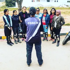 It all starts here, with expert guidance in a supportive group. As your coach, I make sure every rider understands the fundamentals in a no-pressure environment before we even start the engines.
