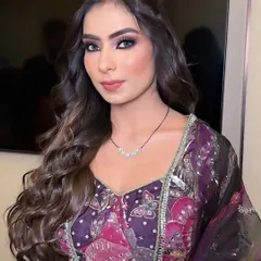 Another angle of this beautiful reception look. The makeup is designed to catch the light and look flawless from every angle.