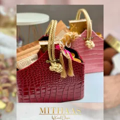 My collection includes a variety of packaging styles, like these chic tote baskets in deep red and soft pink. They are perfect for creating custom hampers for birthdays, bridal showers, or just because.