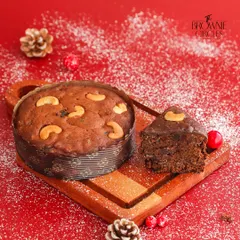 Nothing says Christmas like a traditional Plum Cake. Ours is rich, moist, and packed with rum-soaked fruits and nuts, making it an essential part of any holiday celebration.