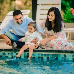 A candid moment of a young family enjoying a relaxed day by the pool. My family photoshoots are about capturing genuine connection and fun, letting you be yourselves while I document the memories.