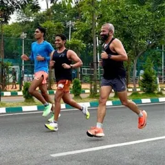 Running with friends turns miles into memories. Here I am, sharing the path and pace with fellow runners at Kanteerava Stadium. These are the moments that build our community and fuel our passion for the sport.