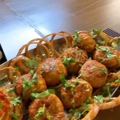 A delicious platter of fried momos from our visit to Railicious. The food was just as impressive as the unique train delivery concept.