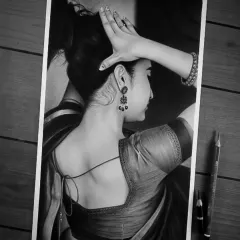 A realistic graphite portrait of actress Priyanka Mohan. My goal was to capture the delicate details in her traditional attire, the flow of her hair, and the soft expression, using careful shading to create a photorealistic effect.