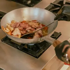 A close-up of the cooking process, ensuring all the ingredients are perfectly cooked and full of flavor.