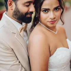 A powerful and direct look from the bride, creating a striking couple portrait. I focus on capturing the personality and emotion of each individual within the frame.