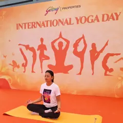 Finding a moment of peace and stillness on stage at the International Yoga Day event for Godrej Properties. Leading by example is a core part of my teaching philosophy.