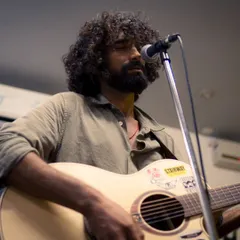 We love providing a stage for passionate singer-songwriters to connect with an audience. Here's a powerful moment from an acoustic set, where every note and lyric could be felt throughout the room.