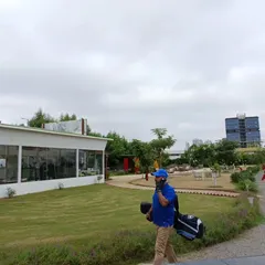 A view of our facility, showing the main building and the expansive green space that makes our range feel like a true escape.