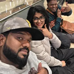 Chilling at the airport with my bandmates during our America tour. The journey is just as memorable as the destination.