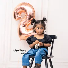 Two years old and full of personality. This stylish toddler is celebrating her second birthday with a modern and chic photoshoot, complete with rose gold balloons.