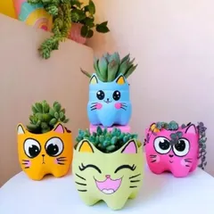 Your garden should be as unique as you are. I love making these quirky, colorful cat planters from upcycled materials. They are a fun, eco-friendly way to add some personality to your space, perfect for holding small succulents.