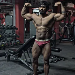 This is the result of years of consistency. A shredded, strong physique built naturally. This isn't just for show; it's the standard of excellence I bring to my own training and to yours. Ready for war.