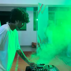 Kicking off the set at the college fest with a blast of green smoke. I always aim to start with high impact, setting the tone for the journey ahead.