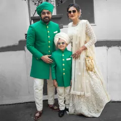 We were ecstatic to design this matching green sherwani set for a father and his adorable son. It's a powerful way to celebrate the special bond they share.