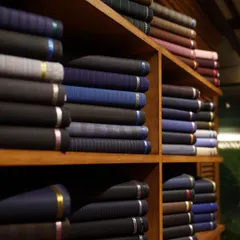 The fabric library at my Gurugram store. Here, you can feel the quality of my curated selection of international fabrics and choose the perfect material for your custom-made suit or jacket.