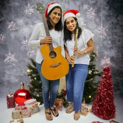 Here I am with our teacher Karen, ready for a Christmas music workshop. We love working together to bring interactive and fun musical experiences to schools and communities.