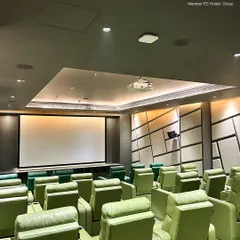 Here is a view of our 31-seat private theatre, facing the expansive 200-inch screen. The room is acoustically treated and features a state-of-the-art Dolby sound system, creating an environment where every scene is felt, not just seen.