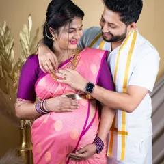 Celebrating your journey with cultural richness is one of our specialties. This traditional saree maternity shoot captures the elegance and beauty of Indian heritage, complete with authentic styling and intimate moments between the couple.