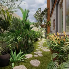 We believe a garden path should be an invitation to explore. For this villa project, we designed a winding stone pathway through a dense, tropical side yard. This approach turns a simple walkway into a journey, creating a sense of discovery and making the garden feel larger and more immersive.