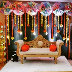 We create vibrant and fun Haldi ceremony decor using traditional elements like colourful Rajasthani umbrellas and marigold garlands. This setup brings a festive and joyful energy to your pre-wedding functions.