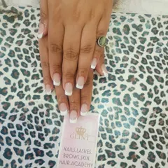 The quintessential classic French manicure. This look features perfectly shaped square nails with a natural pink base and crisp, clean white tips for a timeless and polished appearance.