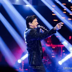 The legendary singer Shaan captivating the audience. I secure and coordinate with top artists to ensure your Sangeet night is an exclusive and unforgettable musical event.