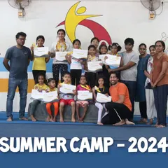 A snapshot of our proud Summer Camp 2024 graduates with their coaches and parents. It's a joy to see so many happy faces holding their certificates of achievement.