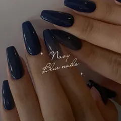 Navy blue nails are a timeless choice that exudes confidence. This solid, glossy navy manicure is bold, elegant, and classic.
