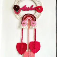 I adore making personalized gifts, and this name hanging for Aisha was a joy to create. Combining a custom nameplate with a rainbow and delicate macrame leaves makes for a perfect nursery decoration.