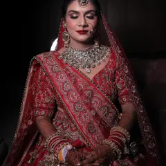 A moment of peace before the ceremonies begin. I gave my bride Himani a bold red lip and defined eyes for a powerful and elegant bridal look.