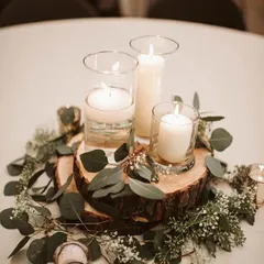 This is the same rustic centerpiece, showing how it can add a touch of natural elegance to any wedding table setting.