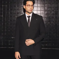 Another angle of Siddhant Chaturvedi's formal look. The styling is clean and minimal, letting the impeccable cut of the double-breasted jacket speak for itself.