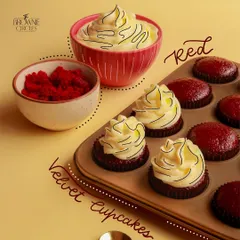 A tray of our Red Velvet Cupcakes, freshly frosted and ready to be enjoyed. They are perfect for any celebration or just because.