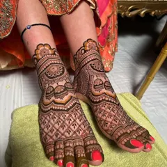 Another angle of the full bridal foot mehndi. This view shows how the dense pattern provides a rich and complete look, perfect for a bride.