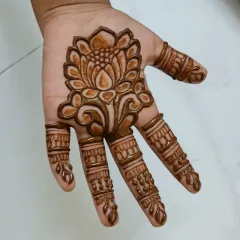 This is the mehndi design right after the paste has been removed. The initial color is a bright orange.