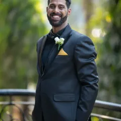 A genuine, happy smile from the groom. I love capturing these relaxed, candid moments that show his true personality.