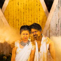 Drenched in love, laughter, and the golden glow of Haldi. This emotional photo shows the couple sharing a powerful, candid moment.
