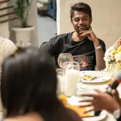 An audience member listening intently during my poetry performance at the Bumble India event.
