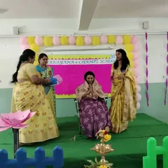 Receiving a token of gratitude on stage from the team at Narayana Techno School. It is always an honor to be appreciated for my work in promoting health and wellness among parents and children.