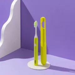 Color blocking can make a product pop. For this electric toothbrush, we used a bold purple background and contrasting props to create a graphic, eye-catching image.
