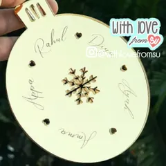 Keep your family close with this personalized Christmas bauble. I can engrave the names of all your loved ones around a central snowflake design, creating a beautiful family tree ornament you'll cherish for years.