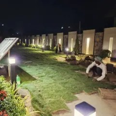 The process of laying natural grass requires precision. Our skilled gardeners carefully place and fit each section of turf to create a uniform, healthy lawn that will establish itself quickly.