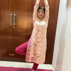 A private yoga session with a client, focusing on the foundational Vrikshasana (Tree Pose). I teach at your pace in the comfort of your home, making yoga accessible for everyone.