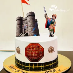 A cake to celebrate Shiv Jayanti. This design features a figure of young Shivaji Maharaj, the Raigad fort, and a powerful Marathi quote, honoring the great Maratha king.
