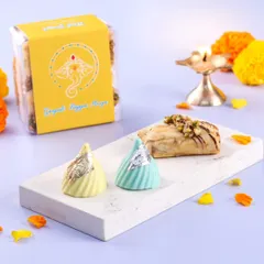 My Ganesh Utsav special offerings, including colourful chocolate modaks and nutty baklava rolls, beautifully presented for the festival.