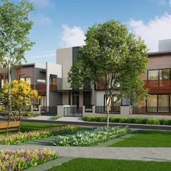 A street-level perspective at AIPL Dream City NXT in Amritsar. The design feels personalized through a mix of housing typologies, varied facade treatments, and layered open spaces, giving residents a sense of individuality within a larger community.