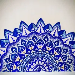 A semi-mandala from my daily sketchbook, this time exploring different shades of blue with small gold accents. Even a quick scribble can be a moment of peace in a busy day.