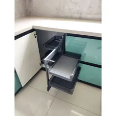 No more hard-to-reach corners. This video showcases a magic corner unit in action, a pull-out system that makes accessing items in the deepest corner of your kitchen cabinets effortless and efficient.